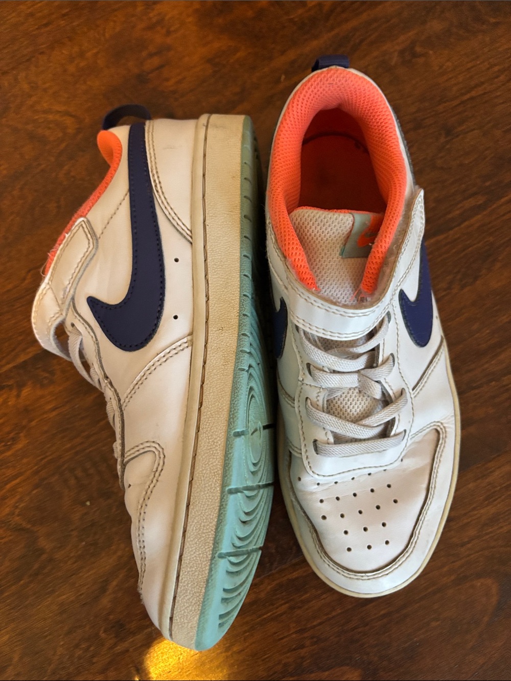 Nike Kids White Sneakers with Blue Swoosh and Orange Lining